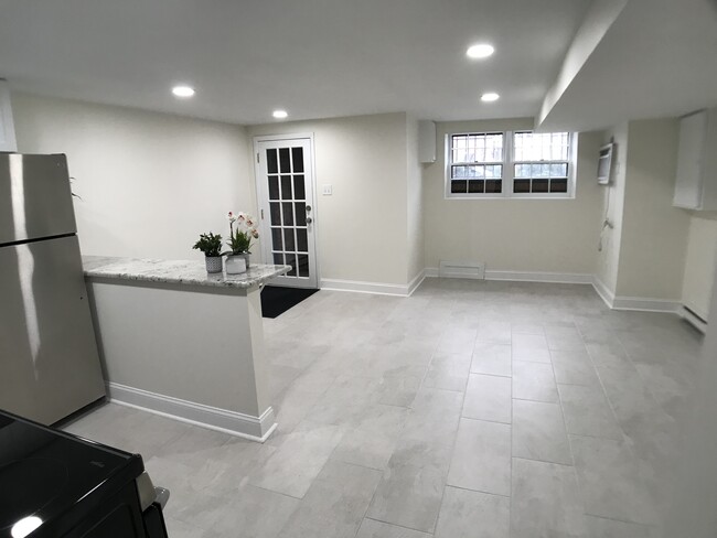 View from kitchen area to living space and entrance - 152 13th St SE Unit #B