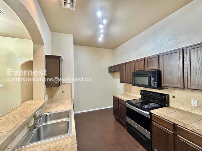 Photo - 3 Bed, 2 Bath Home with Fenced Yard & Garage / Pet-Friendly / Available Now!