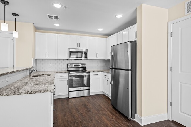 Modern White Kitchens - The Preserve at Whispering Woods Apartments