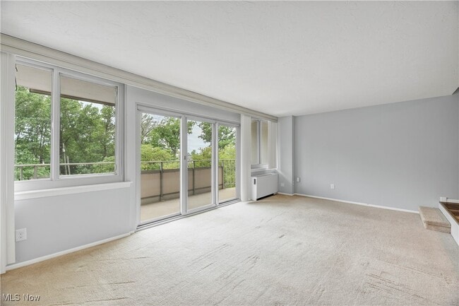 Building Photo - 12900 Lake Ave Unit 321