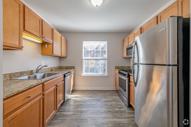 3BR, 2.5BA - 1,450SF - Kitchen - Blue Heron Pointe