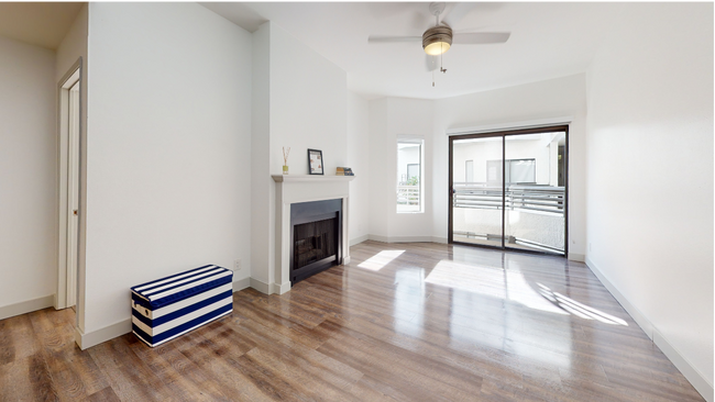 Bright lit open floor plans featuring sustainable hardwood flooring.
