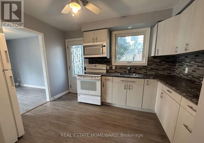 Photo - 511 Harris Ct Unité Main