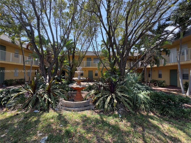 Building Photo - 4061 N Dixie Hwy Unit 23