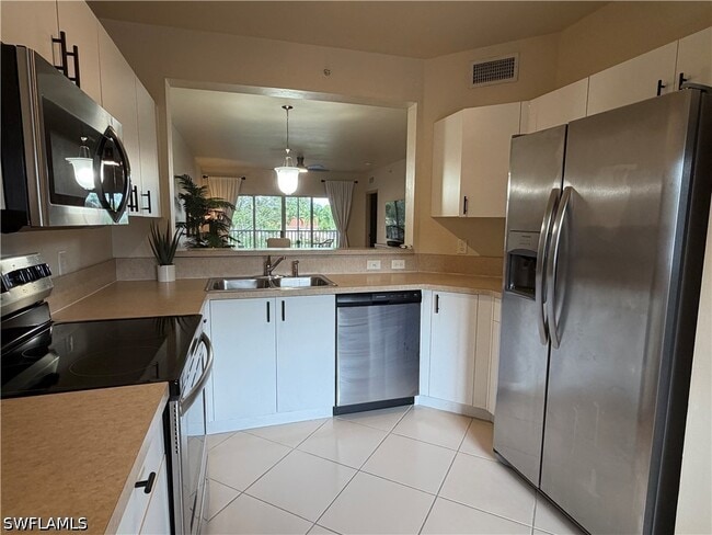 Photo - 7839 Regal Heron Cir Unit 202