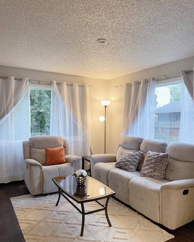 Living room - 8001 E 3rd Ave Apartments Unit 2