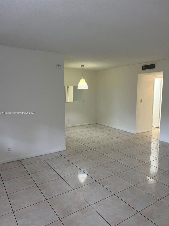Building Photo - 8704 NW 35th St Unit 208 Rental