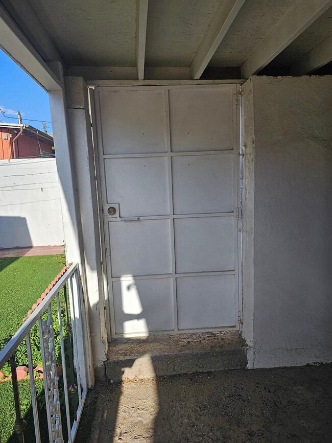Secure gate to parking spot - 504 Cincinnati Ave Unit Rear