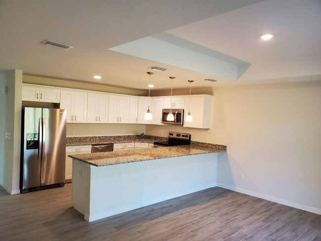 Photo - Coming Soon Newer 3x2 Duplex Unit Unit 4740 13TH ST SW