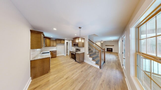 Photo - Beautifully Upgraded Home | Stone Fireplace, Open Kitchen and Two-Car Garage