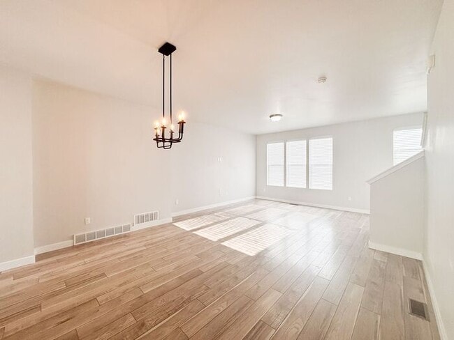 Photo - Stunning and Spacious 3BR 3BA Townhouse w/ Quartz Kitchen + Garage Parking + Modern Finishes in E...