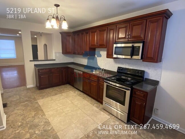 Building Photo - 5219 Upland St Rental