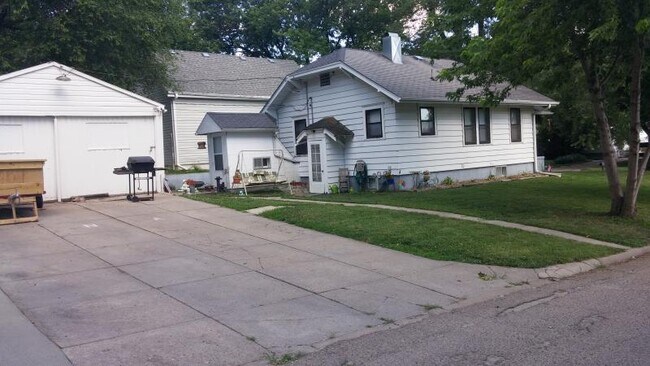 Rear entry of house offers walkout basement and entry into home.