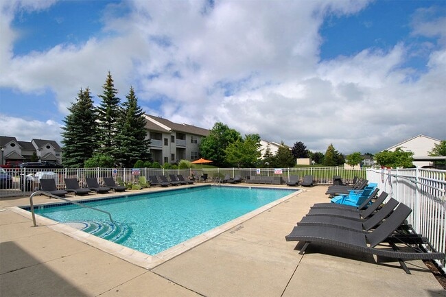 Outdoor Swimming Pool and Loungers