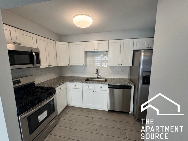 Building Photo - 8545 W Arnold St Unit 2NE Rental