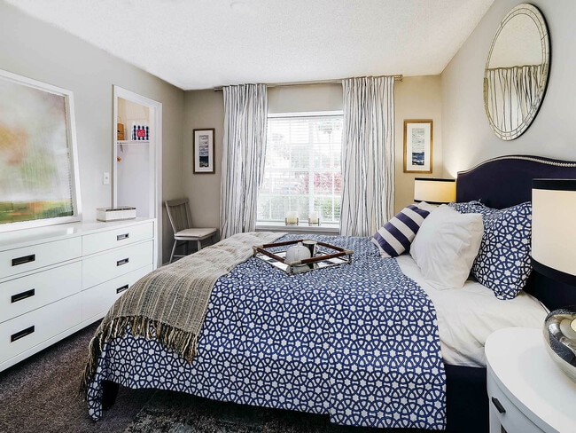 Experience a blend of comfort and style in this beautifully decorated bedroom, perfect for relaxation.