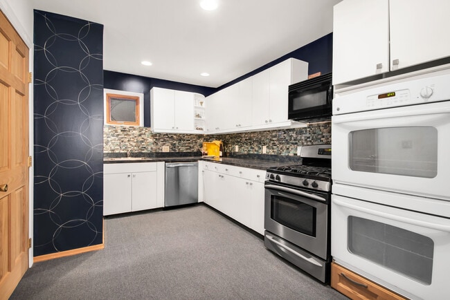Big eat-in kitchen! - 680 Belmont Ave Apartment Unit #2