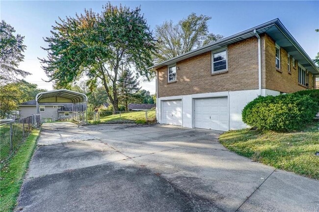 Photo - Coming Soon - Charming 3-Bedroom Home with Fenced Yard & Spacious Deck in Kansas City