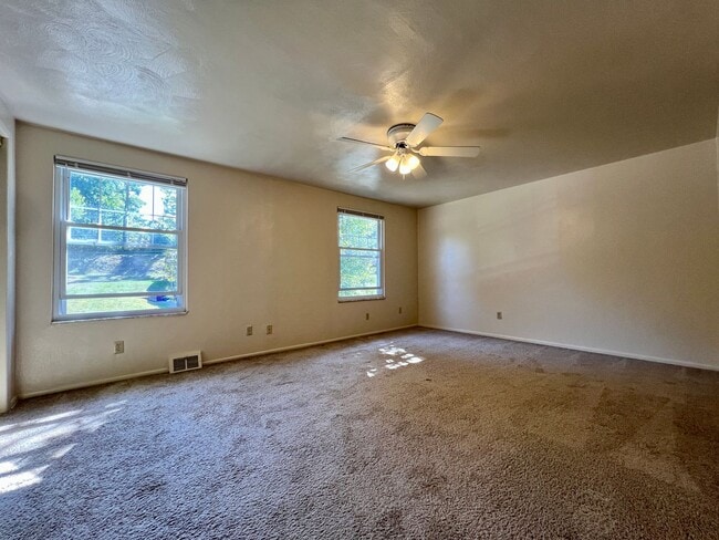 Photo - Lovely 2BR Townhome at Regency Place! Spacious Rooms -Attached Garage & Yard! Tour Today!