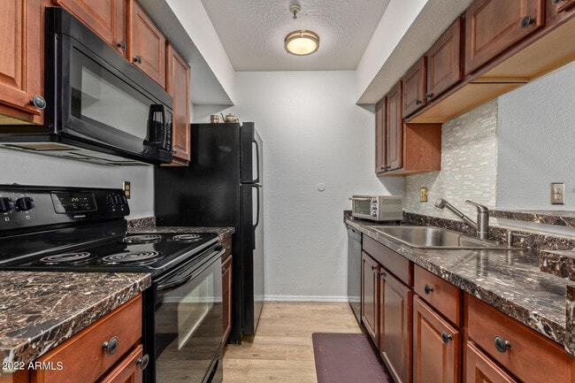 Building Photo - 4554 E Paradise Village Pkwy N Unit 239