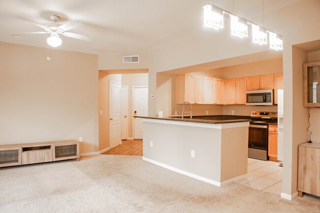 Living room to front entrance - 5125 Palm Springs Blvd Unit #11206