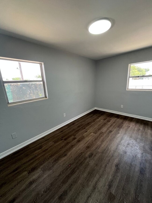 Photo - Great Location for This 4BR/1BA Lakeland Home! Large Screened In Porch, Fenced Backyard