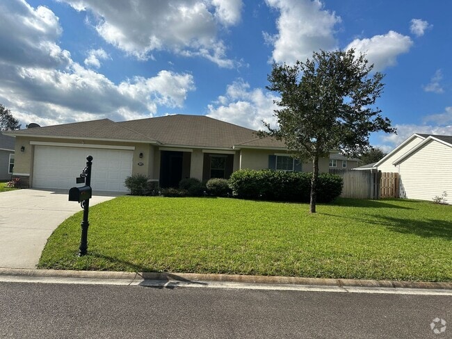Building Photo - Spacious 4-Bedroom Home with Fantastic Ame...