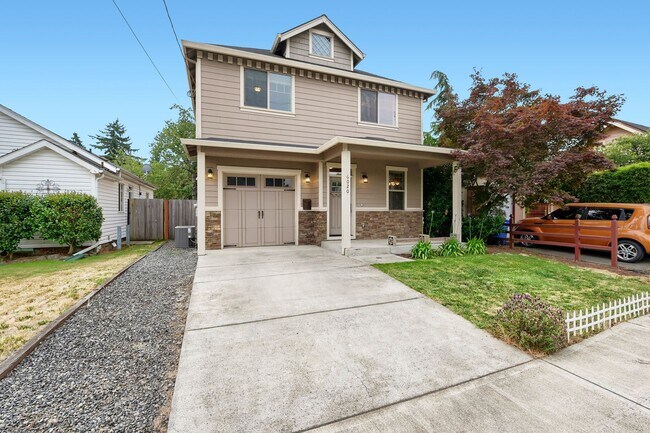 Photo - Custom-Built 4BR/2.5BA Two-Story Near Woodstock — Quartz Island Kitchen, Gas Fireplace & Fenced Y...
