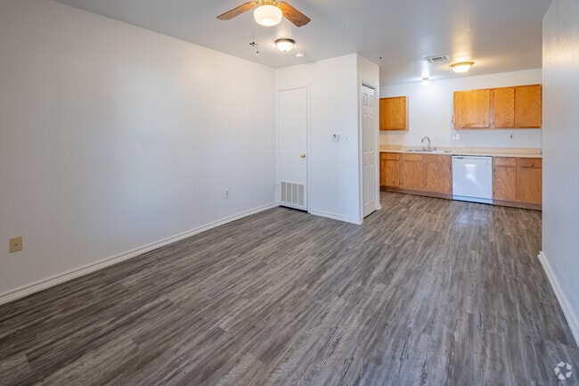 2BR, 1BA - 900SF - Living, Dining and Kitchen - Stillwater Melrose A 62+ Community