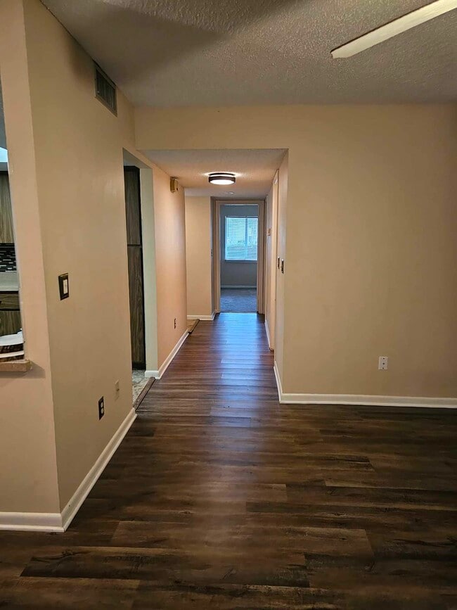 Hallway, nice wood flooring - 589 Fairways Cir Unit A