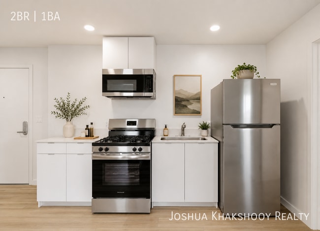 Building Photo - 7655 San Pedro St Unit 103