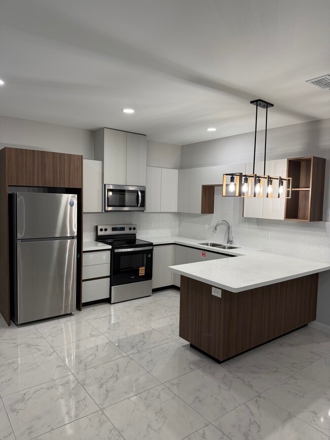 Photo - 1004 W 8th St Unit 1