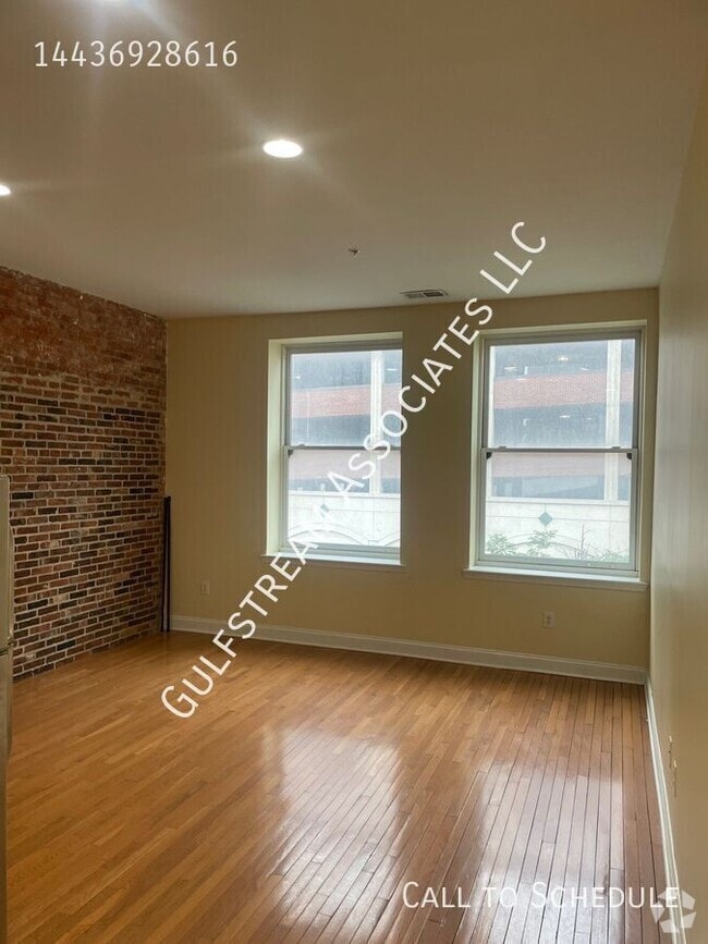 Building Photo - 106 N Eutaw St Unit Apt 3A