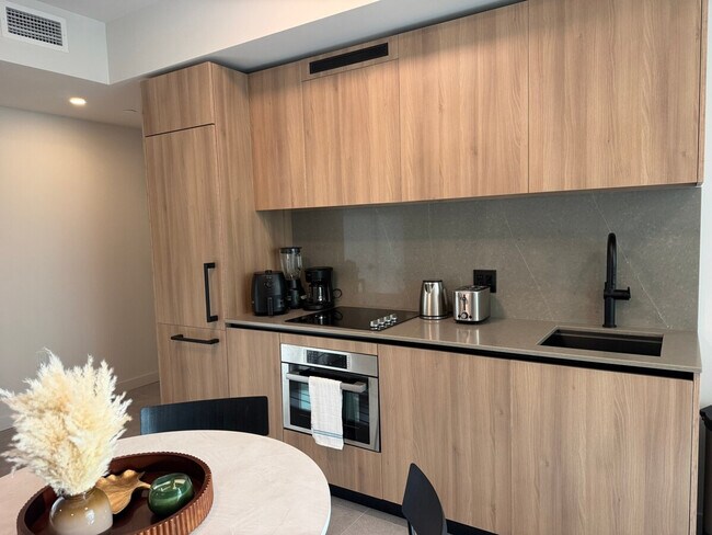 Photo - 61 NE 4th St Unidad SI ID1502547P