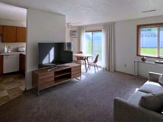 Living Room, Carpet - Valleyside Townhomes