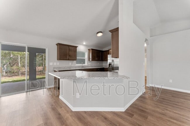 Building Photo - 9461 N Sandree Dr Rental
