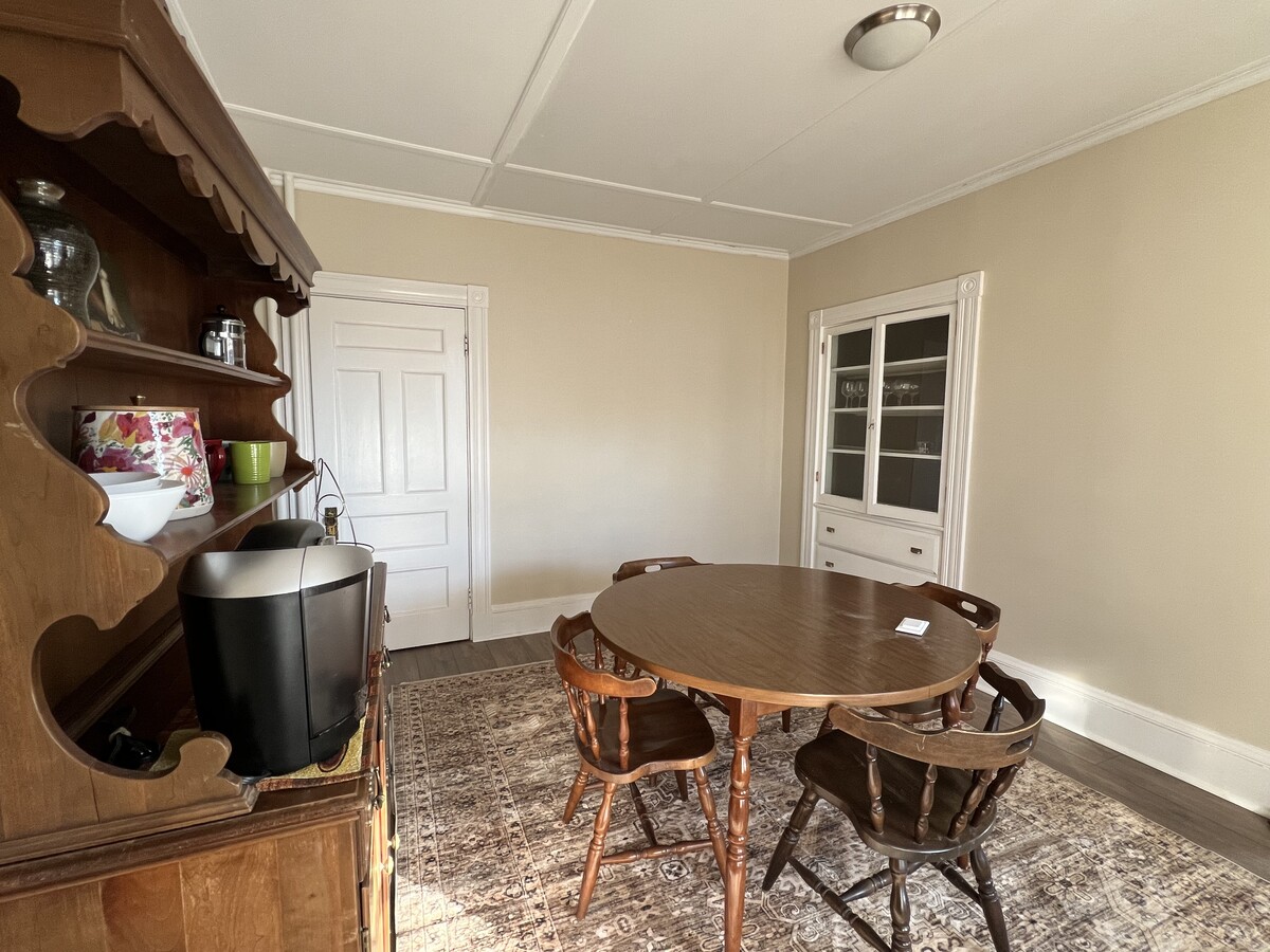 Dinning room with built in and coffee bar - 23 Vine St Apartments Unit 1