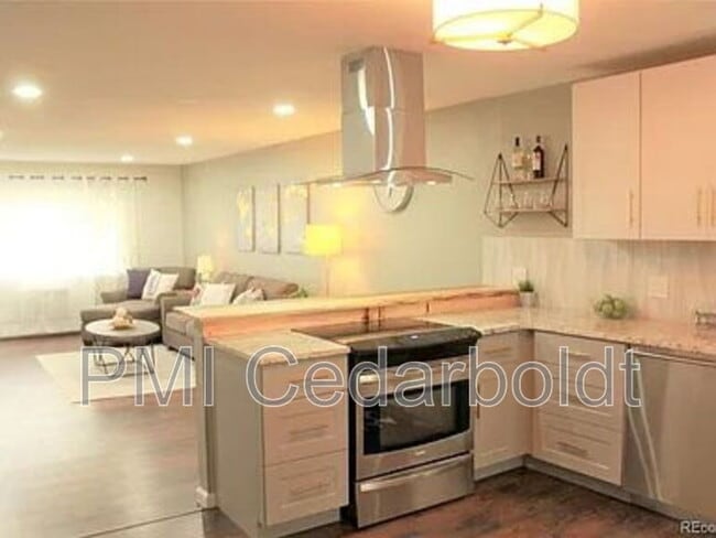 Building Photo - 7050 W Cedar Ave Unit #206