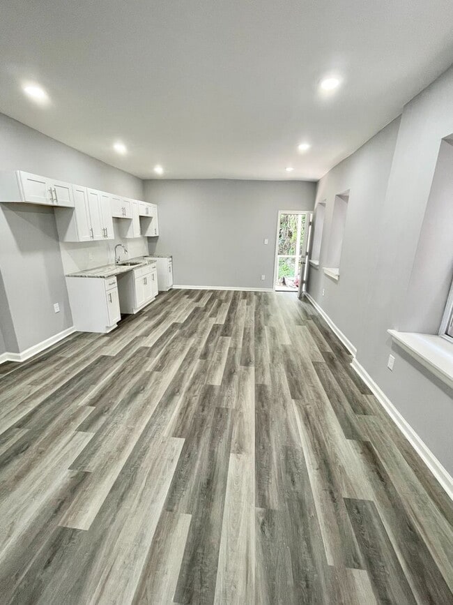 Photo - Move-In Ready 4BR Home with Bright Interiors & Ample Storage