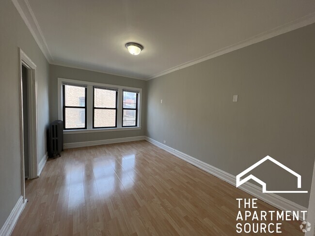 Building Photo - 5451 S Cornell Ave Unit 409 Rental