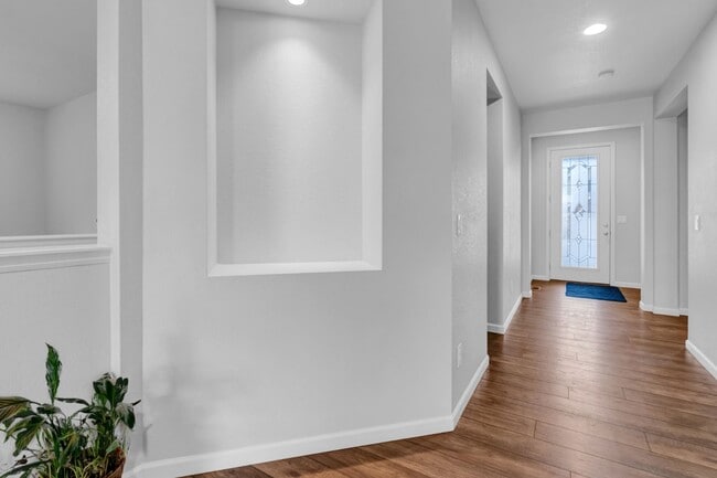 Photo - Beautiful low-maintenance ranch home with turf in front and back!