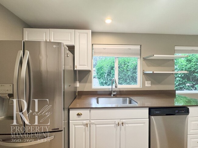 Photo - Modern Split-Level Home with Two Living Spaces & Expansive Yard in Port Orchard