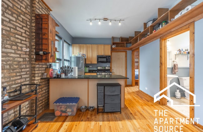 Building Photo - 1351 N Washtenaw Ave Unit 1S
