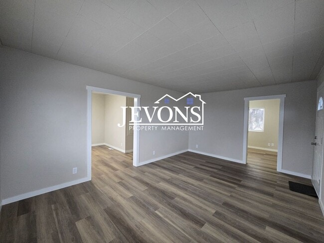 Photo - 3 bedroom home with washer and dryer – 1-acre lot next to an orchard – Large and small pets allowed!