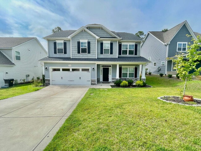 Building Photo - Spacious 4 Bedroom, 2 And A Half Bath Nest... Rental