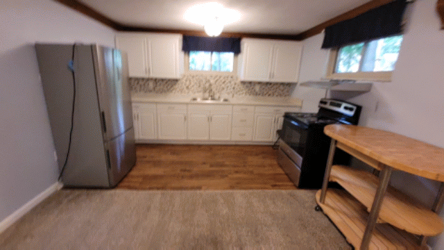 área de cocina - 9362 Woodledge Pt Unidad Lower level apt in private trilevel home