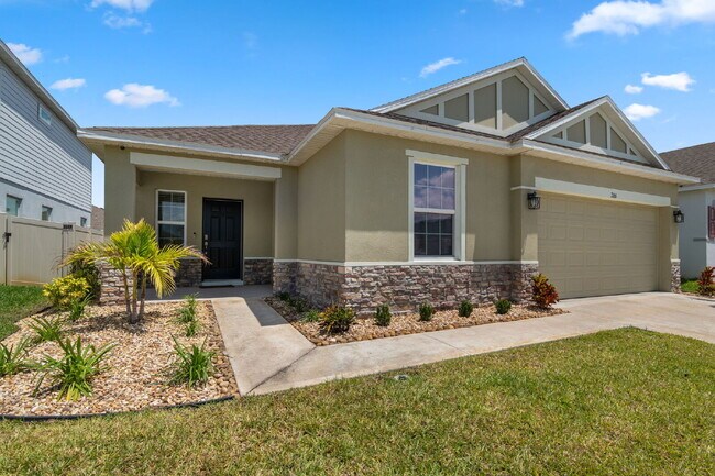 Photo - Elegant 3-Bed, 2-Bath Home in Gated Palm Bay Community with Resort-Style Amenities