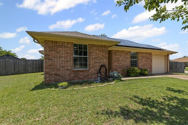 Photo - Welcome to this inviting 3-bedroom, 2-bath...