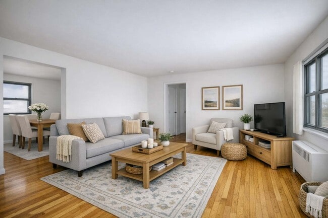 1BR, 1BA - Living Room - Virtually Staged - Maybrook Garden Apartments