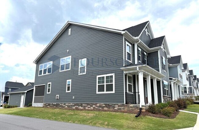 Photo - Spacious Corner-Lot Home with Guest Suite, Screened Porch & Detached 2-Car Garage – Resort-Style ...